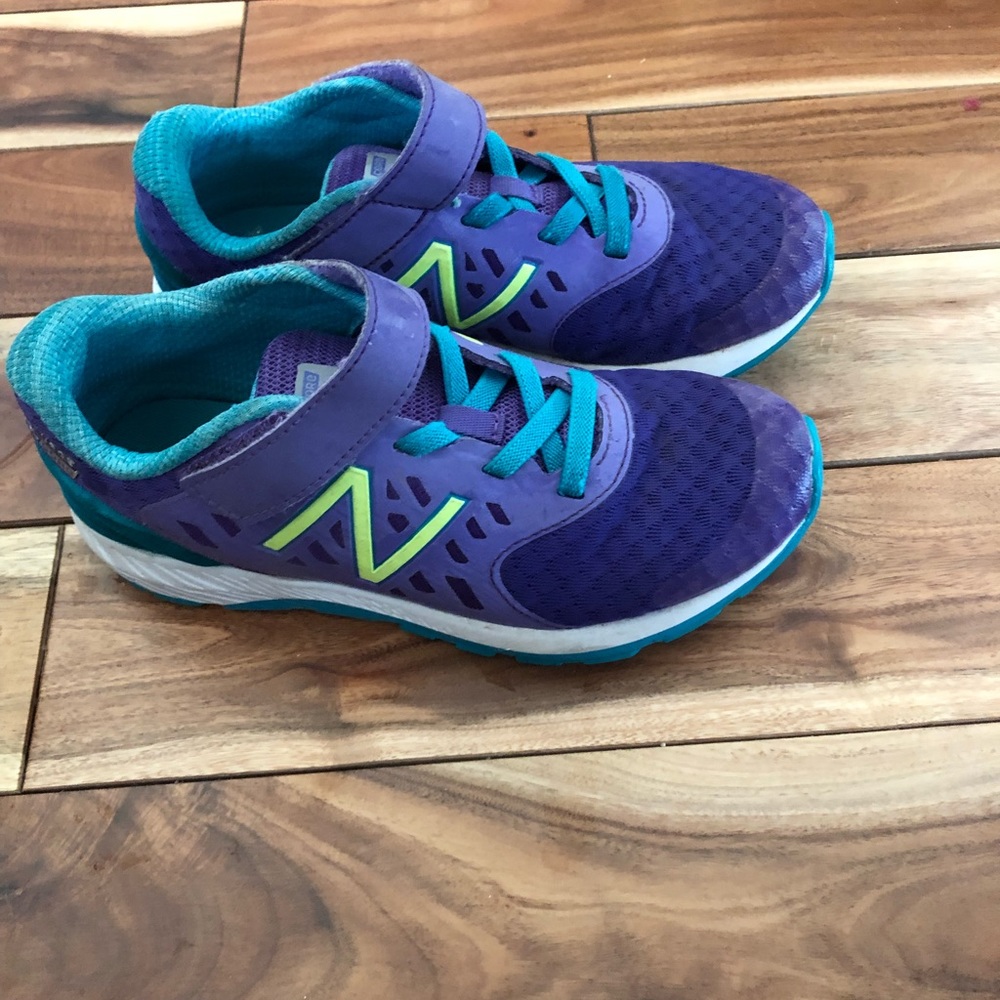 Like new purple New Balance size 3